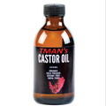 Bottle of TMAN's Castor Oil with a black label on a white background